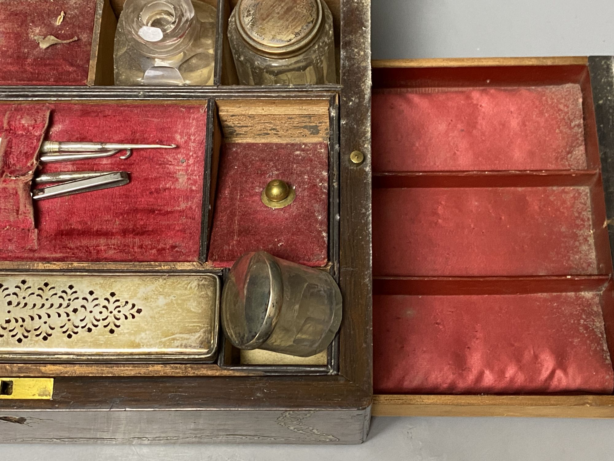 A 19th century mother of pearl inlaid rosewood travelling toilet box